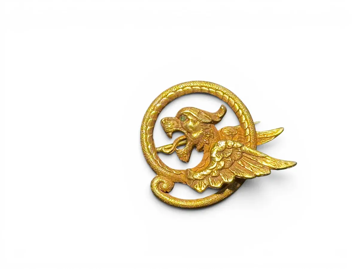 Antique English 14K Yellow Gold Chimera Motif Brooch With Emerald Eye
